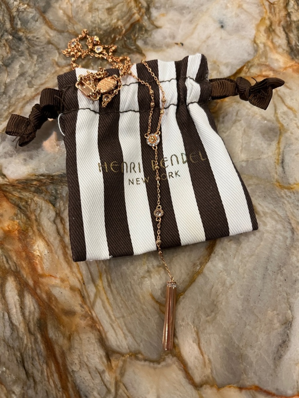 henri bendel Rose Gold Necklace with Brown & White Striped Pouch